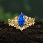 Nature-Inspired 6 Prong Marquise Sapphire Engagement Ring Set with Vine Motif